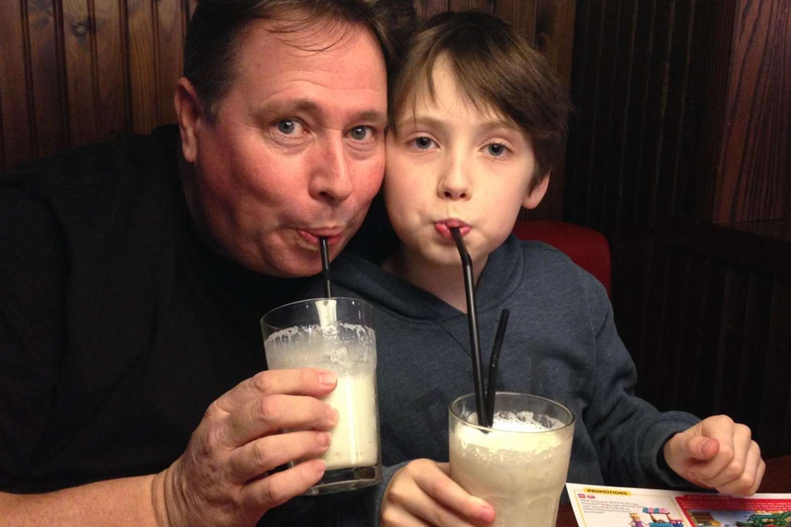 Chief photographer Barry Goodwin with his son Beau