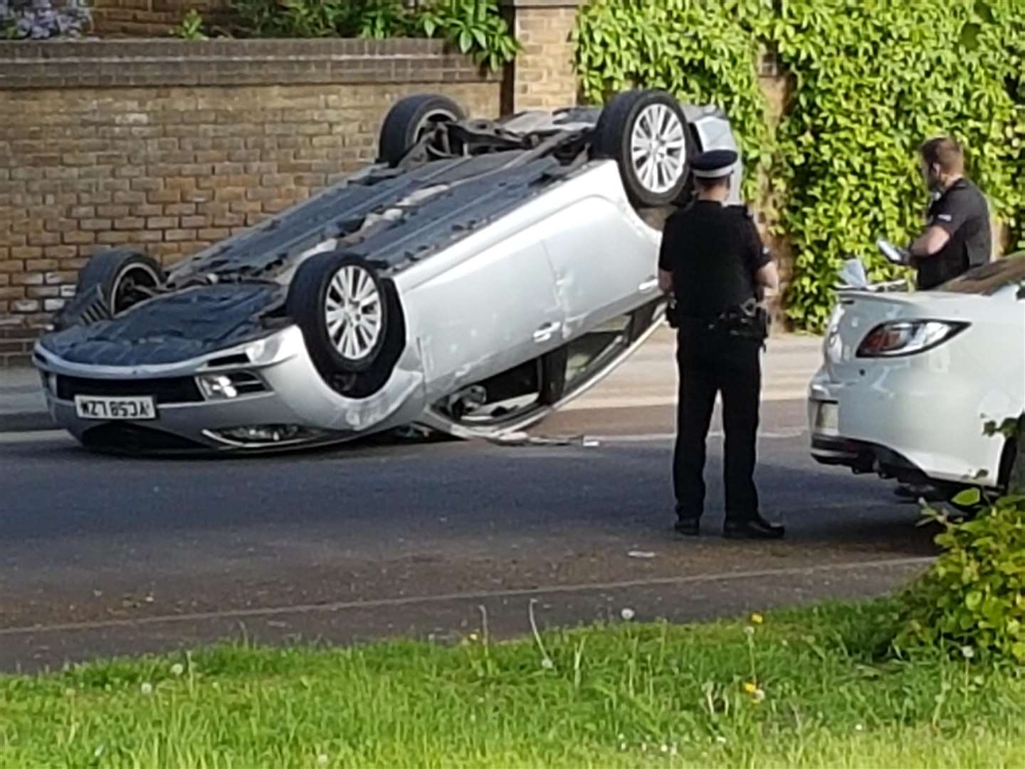 Overturned car on Esplanade. Picture: Stuart Tranter