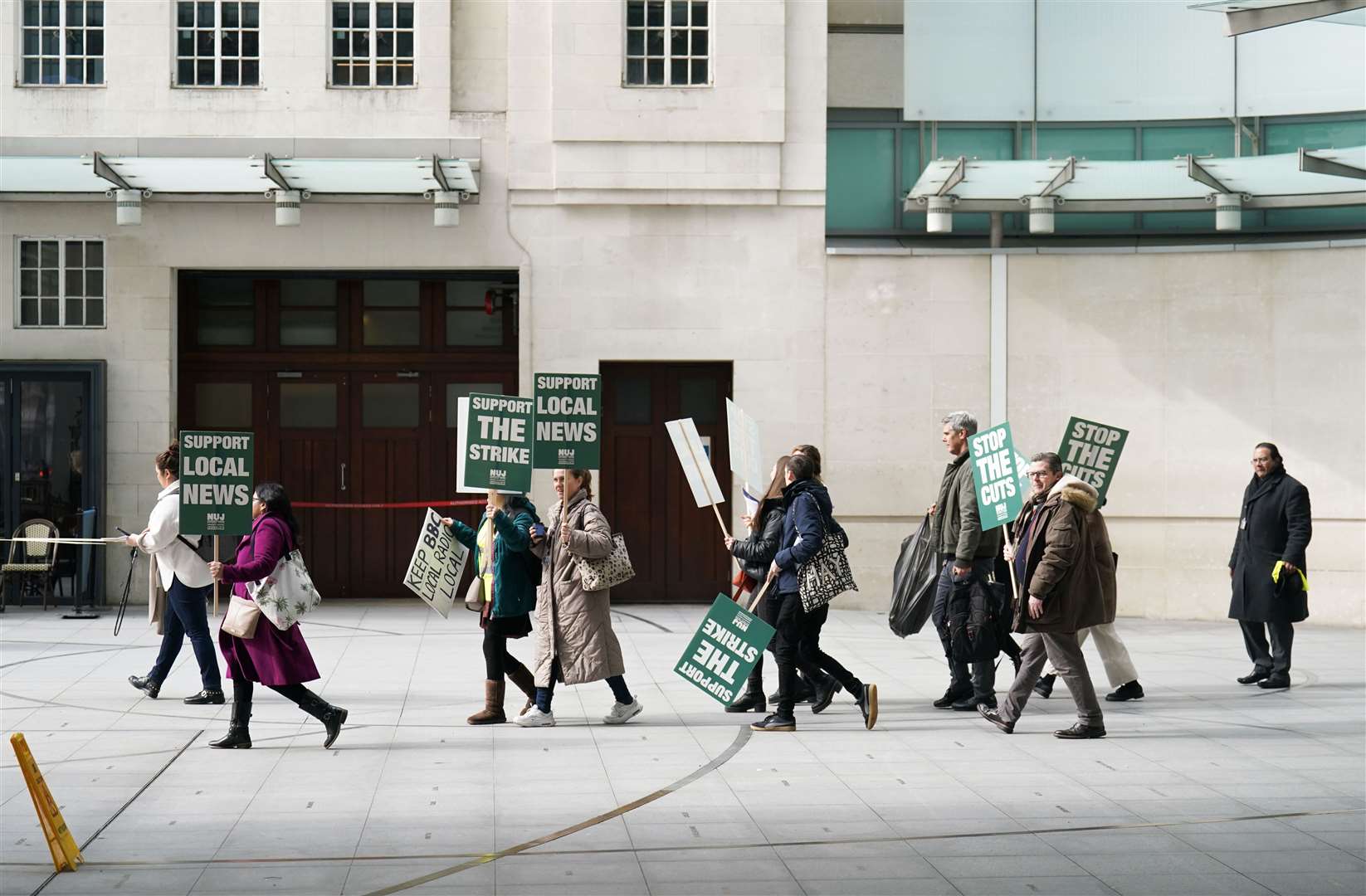 NUJ members join a picket line in London (James Manning/PA)