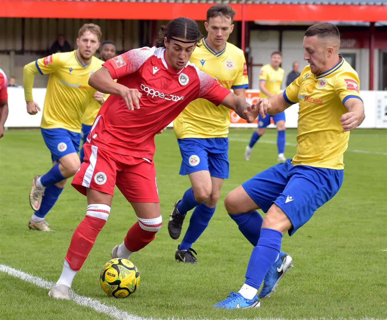 Action from Hythe’s 2-1 defeat by Eastbourne Town on Saturday. Picture: Randolph File