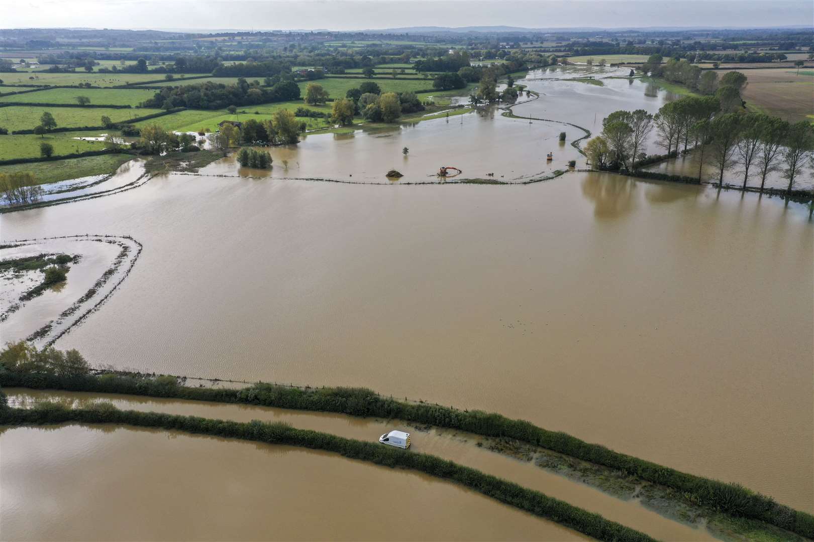 A van stuck in floodwater near Buckingham as Storm Alex brought heavy rain (Steve Parsons/PA)