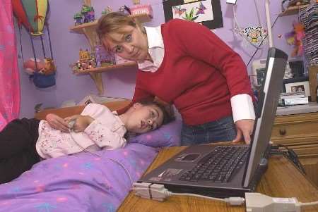 Lucy at home with her mother, Hayley. Picture: PAUL DENNIS