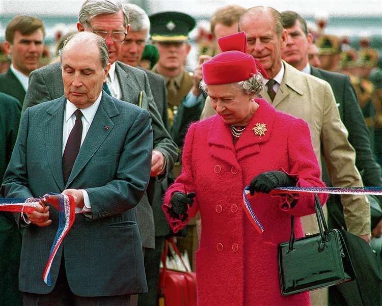 Queen Elizabeth II and France's President Mitterand cut the ribbon to officially open the Channel Tunnel on May 6, 1994. Photo: PA Tim Ockenden