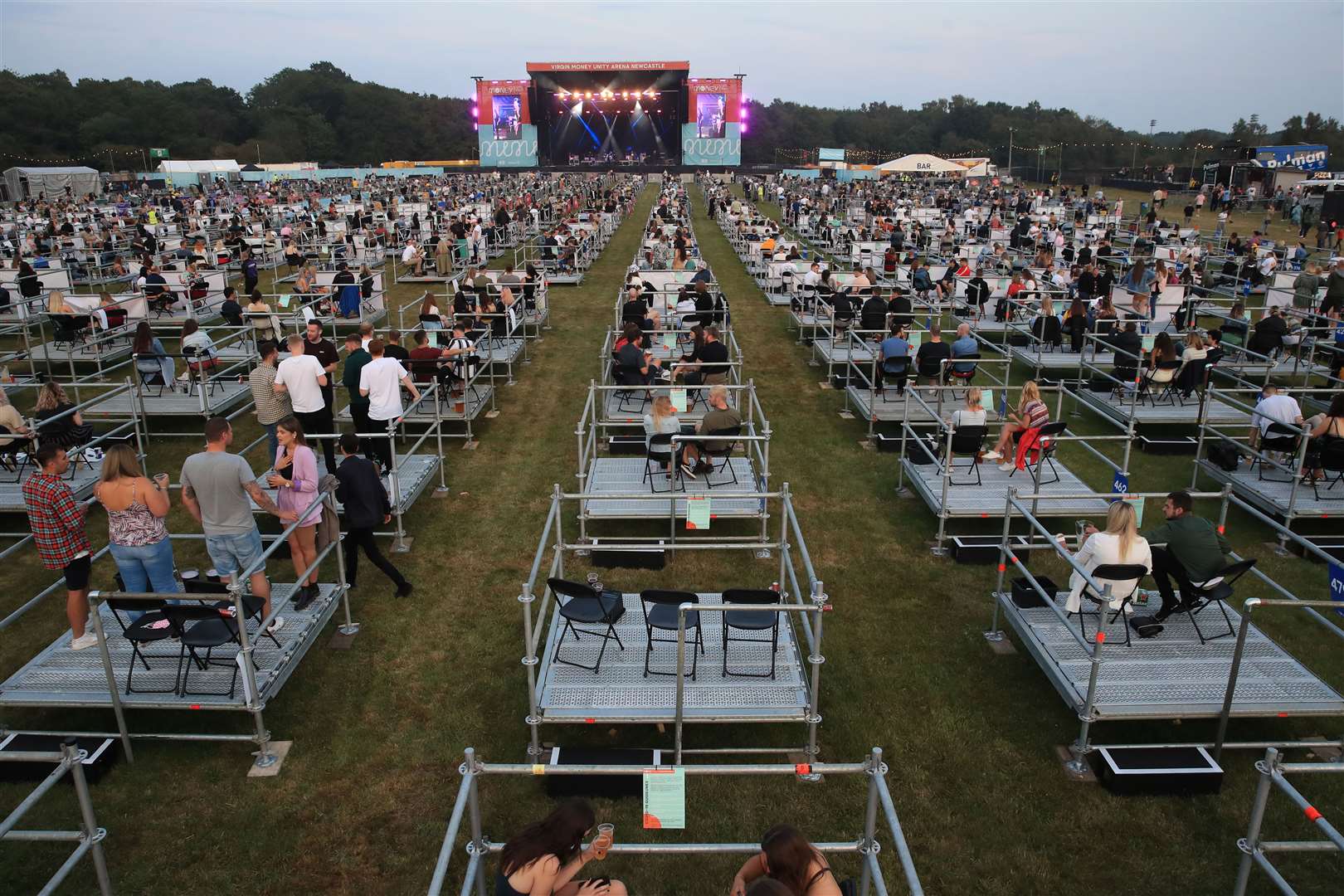 Fans arrive ahead of sunset (Owen Humphreys/PA)