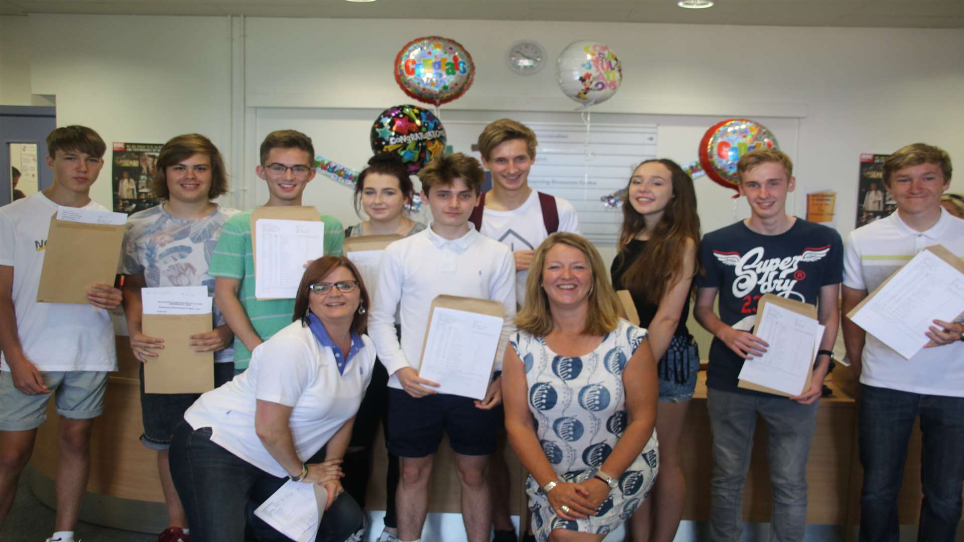 Pupils and staff at King Ethelbert School celebrate on GCSE results day