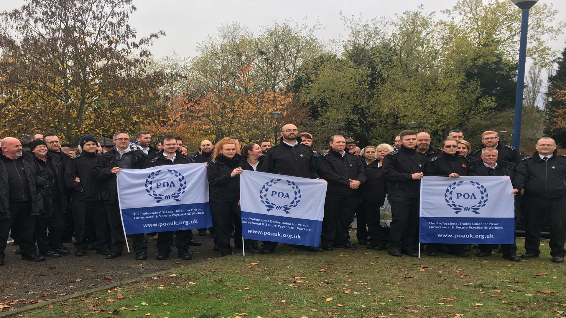 Staff gather outside the Sheppey prison cluster