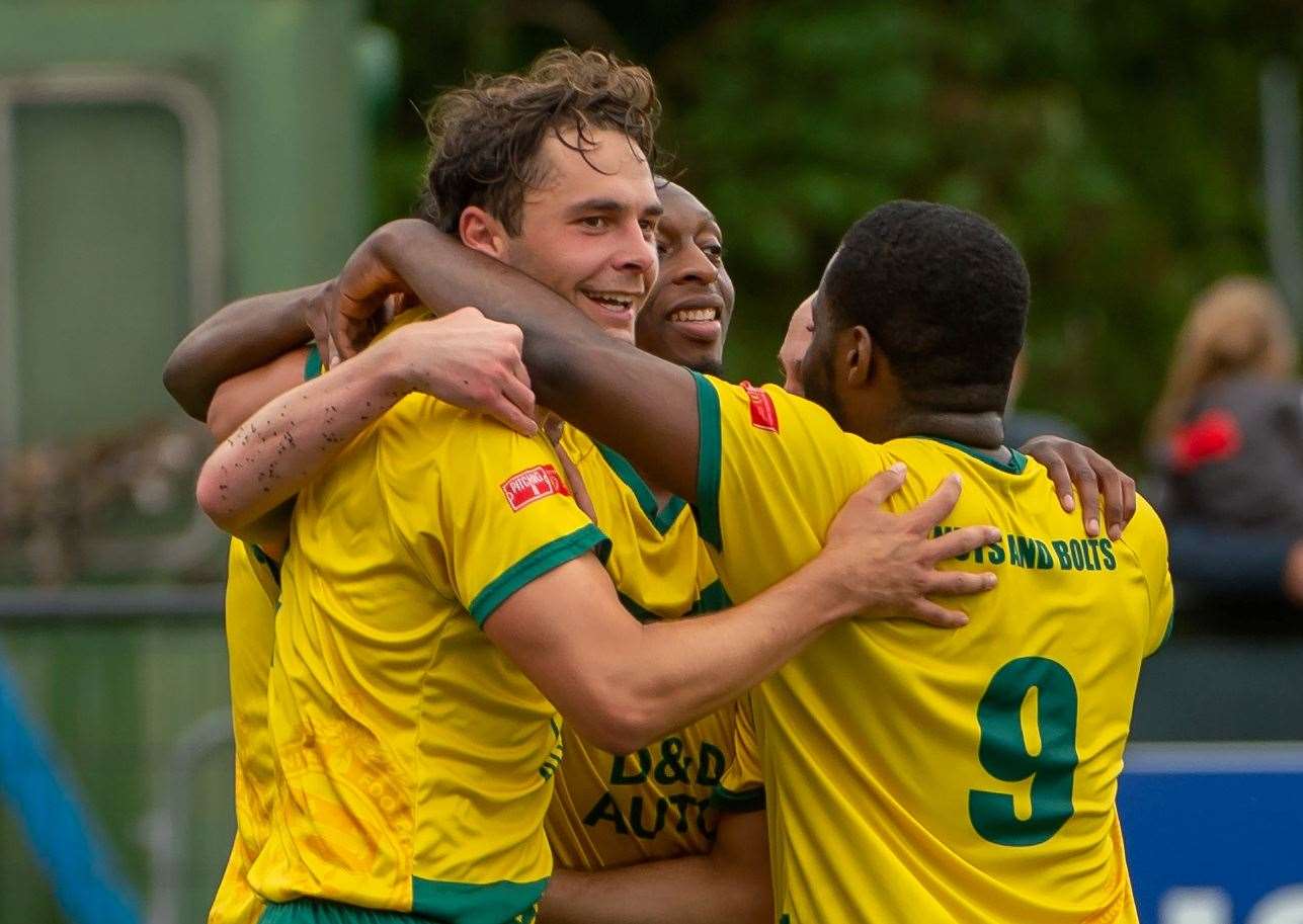 Ian Draycott celebrates making it 2-0 to Ashford with his team-mates. Picture: Ian Scammell