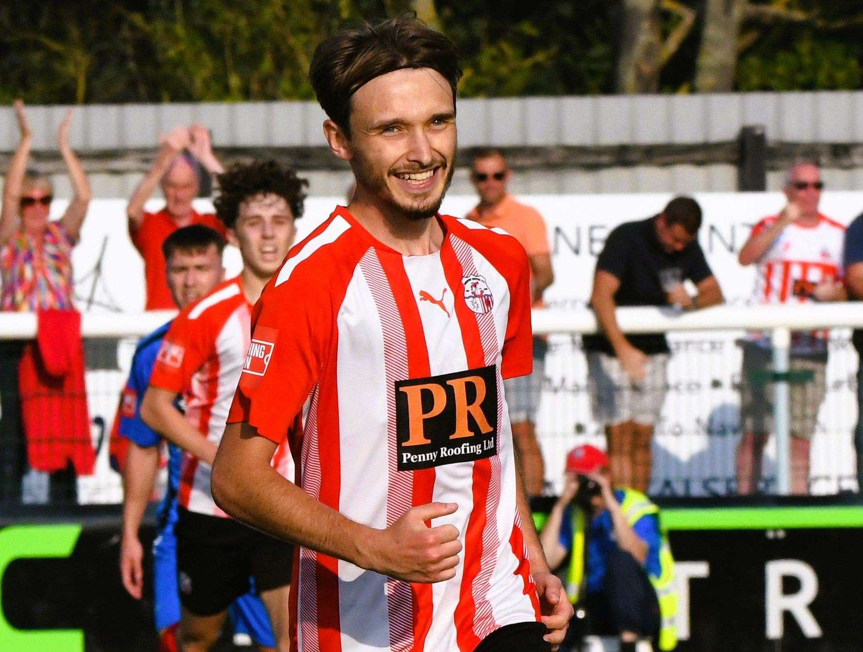 Jacob Lambert is all smiles after putting Sheppey in front late on in their 2-0 Isthmian South East win over Steyning Town Community on Saturday. Picture: Marc Richards