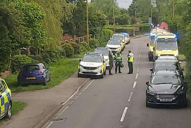 Several police and ambulance cars at the scene of the crash. Picture: John Dalton