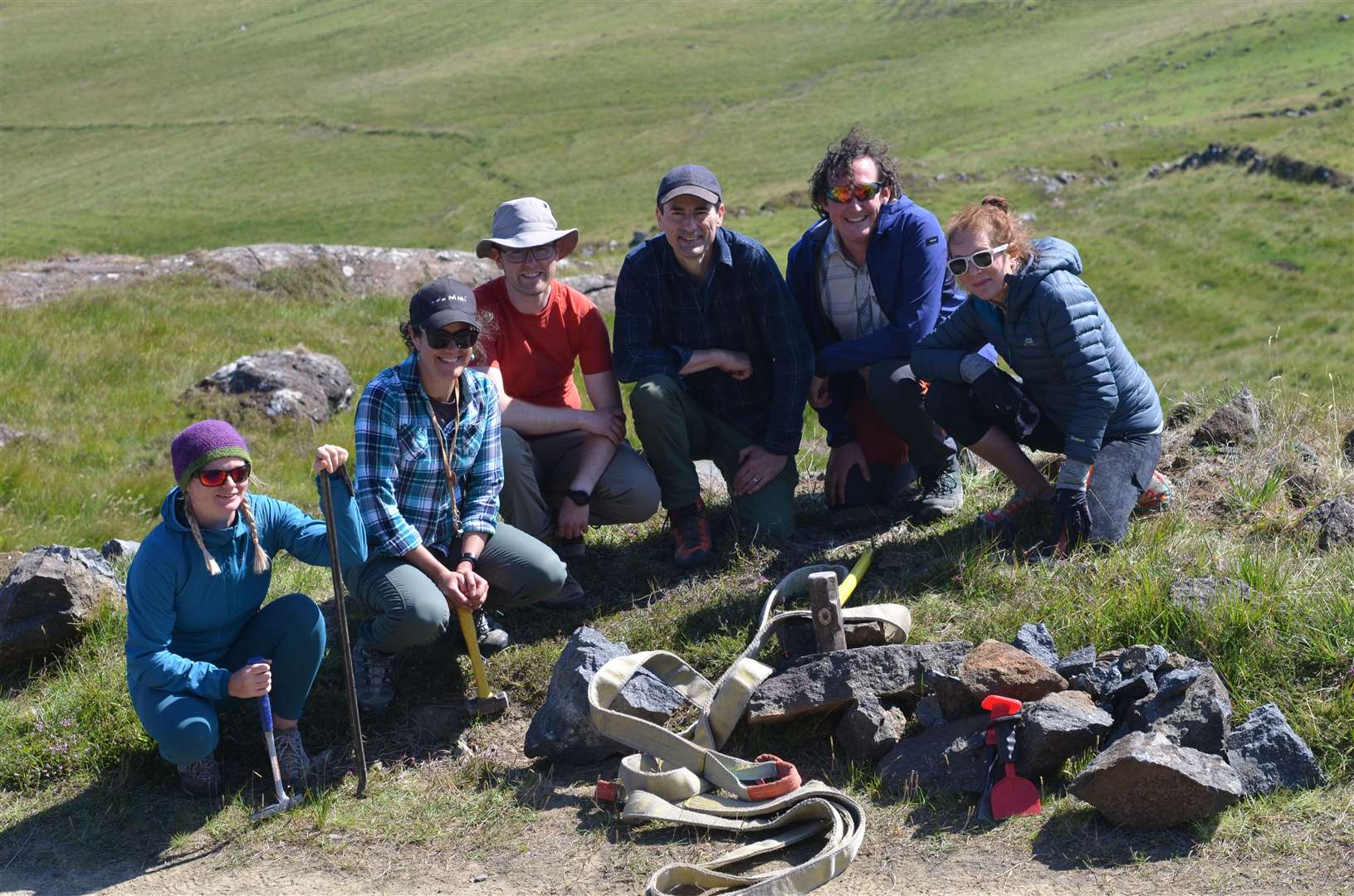 The sample team collecting rocks on Rum (Luke Daly/University of Glasgow/PA)