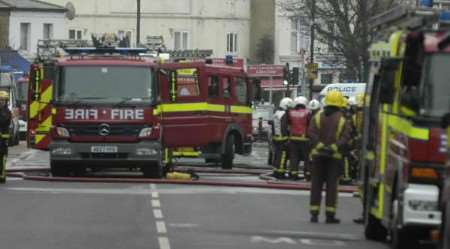 Fire crews at timber yard in Maple Road, Penge. Picture: ANDREW CRITCHELL