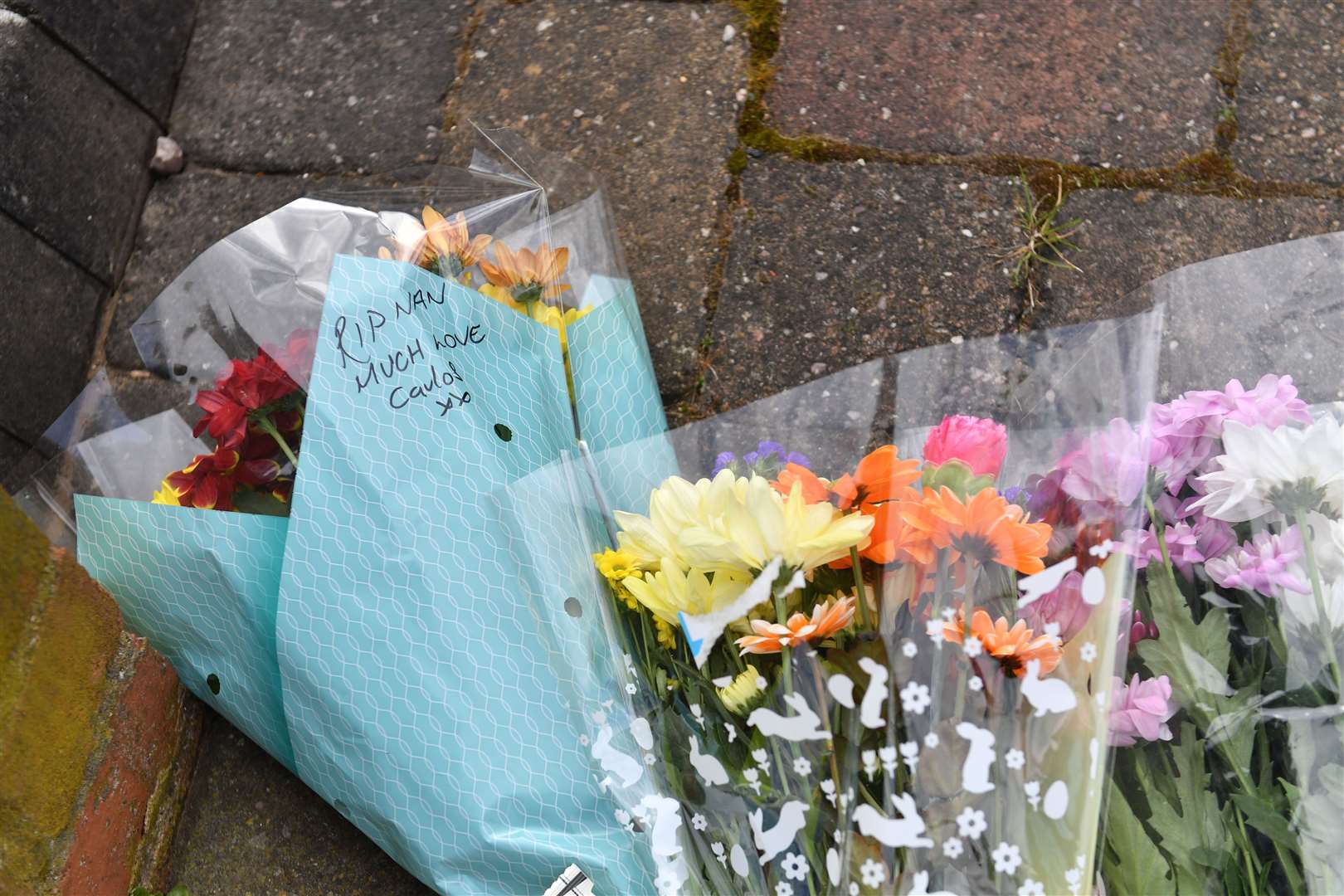 One bouquet displayed the message ‘RIP Nan’ (Jacob King/PA)