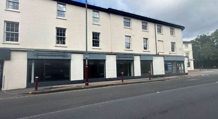 The building includes the former Wesley Barrell showrooms and seven self-contained flats