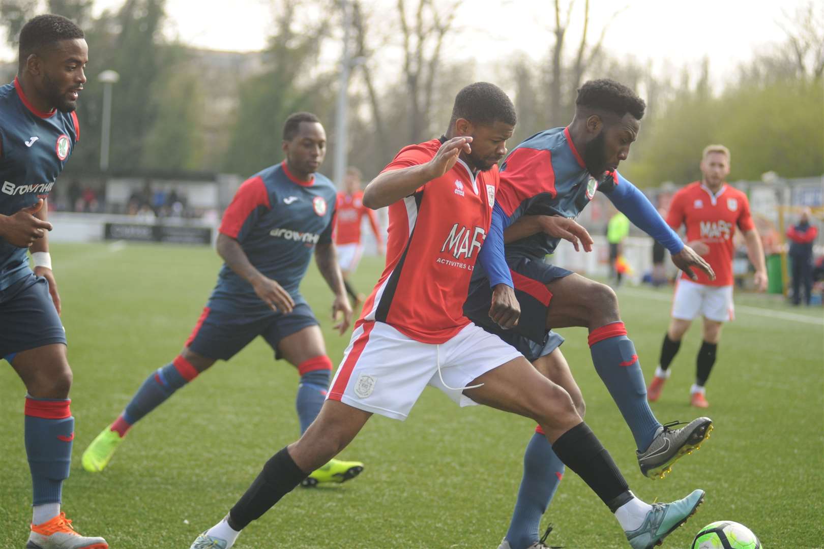 Byron Walker up against three Beckenham players Picture: Steve Crispe