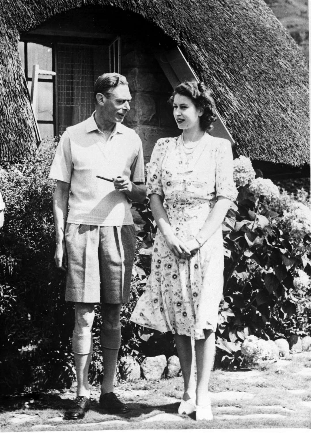 George VI with his daughter Princess Elizabeth during a visit to Natal National Park in South Africa in 1947 (PA)