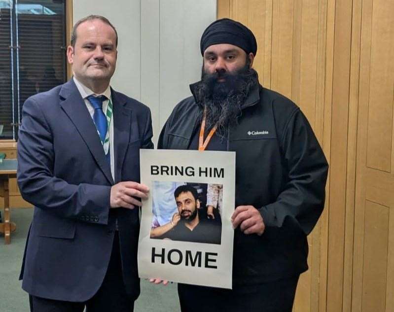 West Dumbartonshire MP Douglas McAllister and Gurpreet Singh Johal (Reprieve charity/PA)