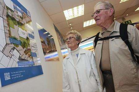 Gwen and Peter Fifield look at plans.