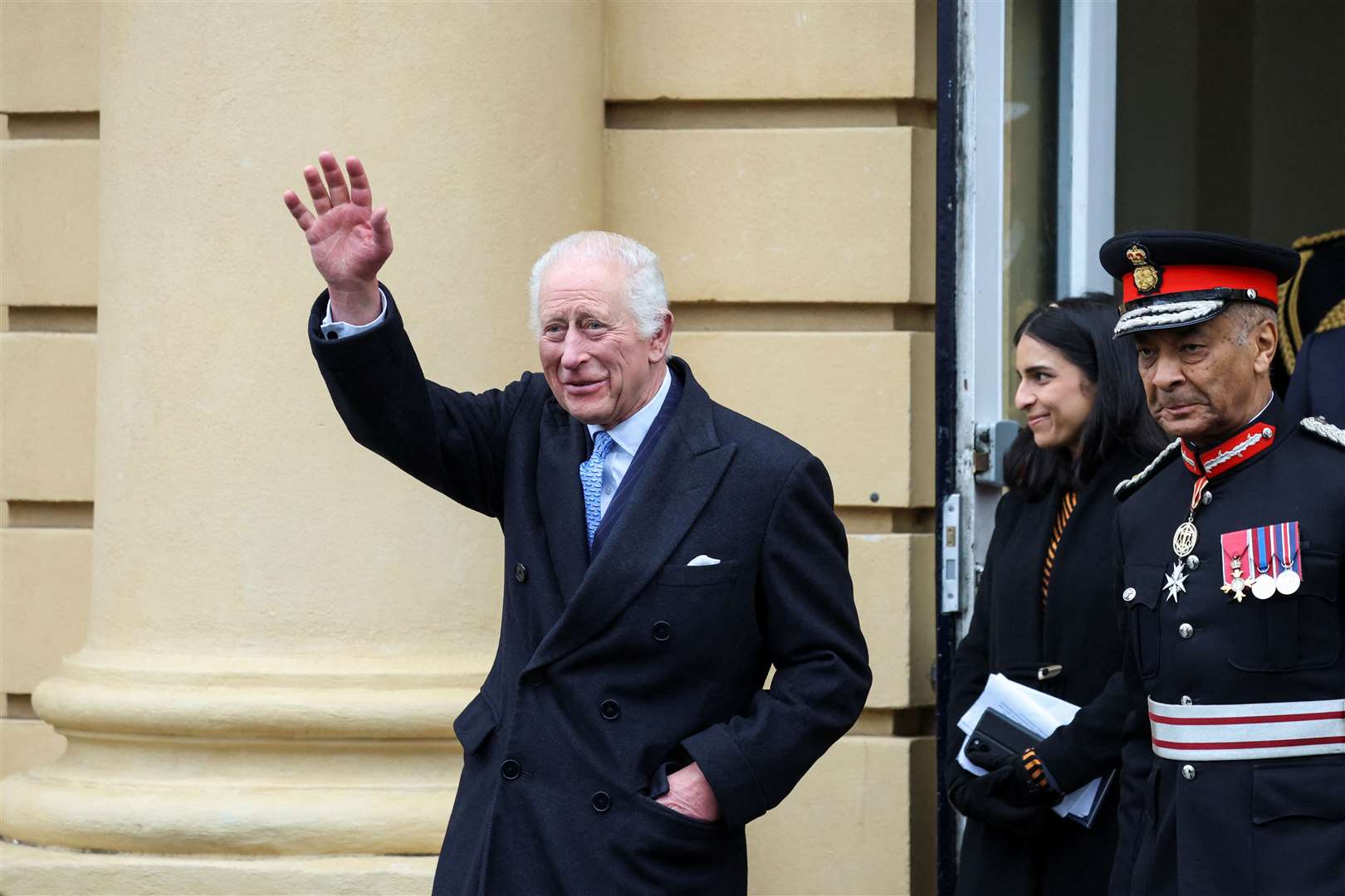 Charles waved to well-wishers before going on an impromptu walkabout (Mina Kim/PA)