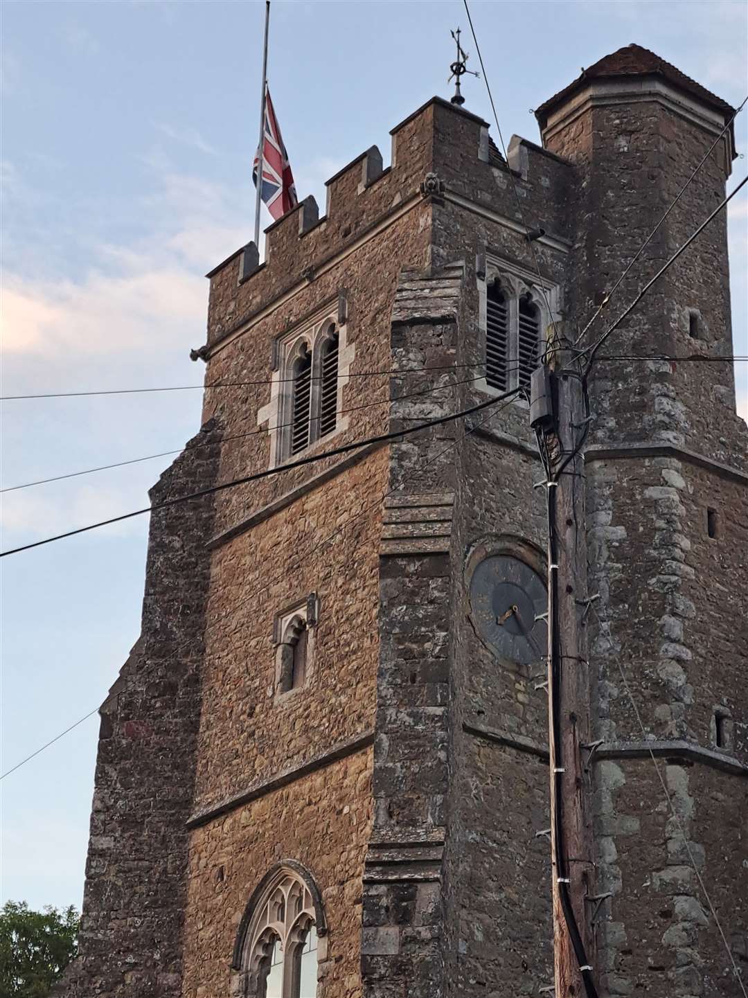 Flag at half mast at All Saints, Birling