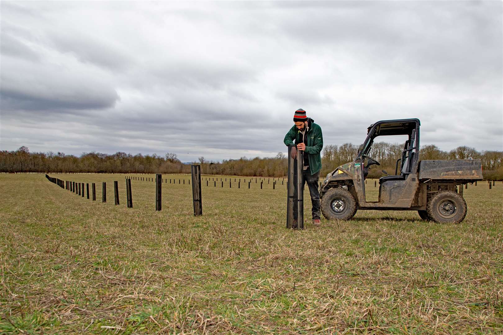 National Trust ranger Stuart Gilmore checks the apple trees planted as part of the project (Mike Selby/PA)