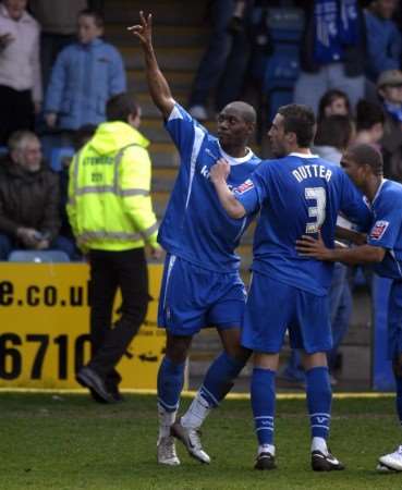 Dennis Oli salutes the Rainham End after scoring Monday's winner