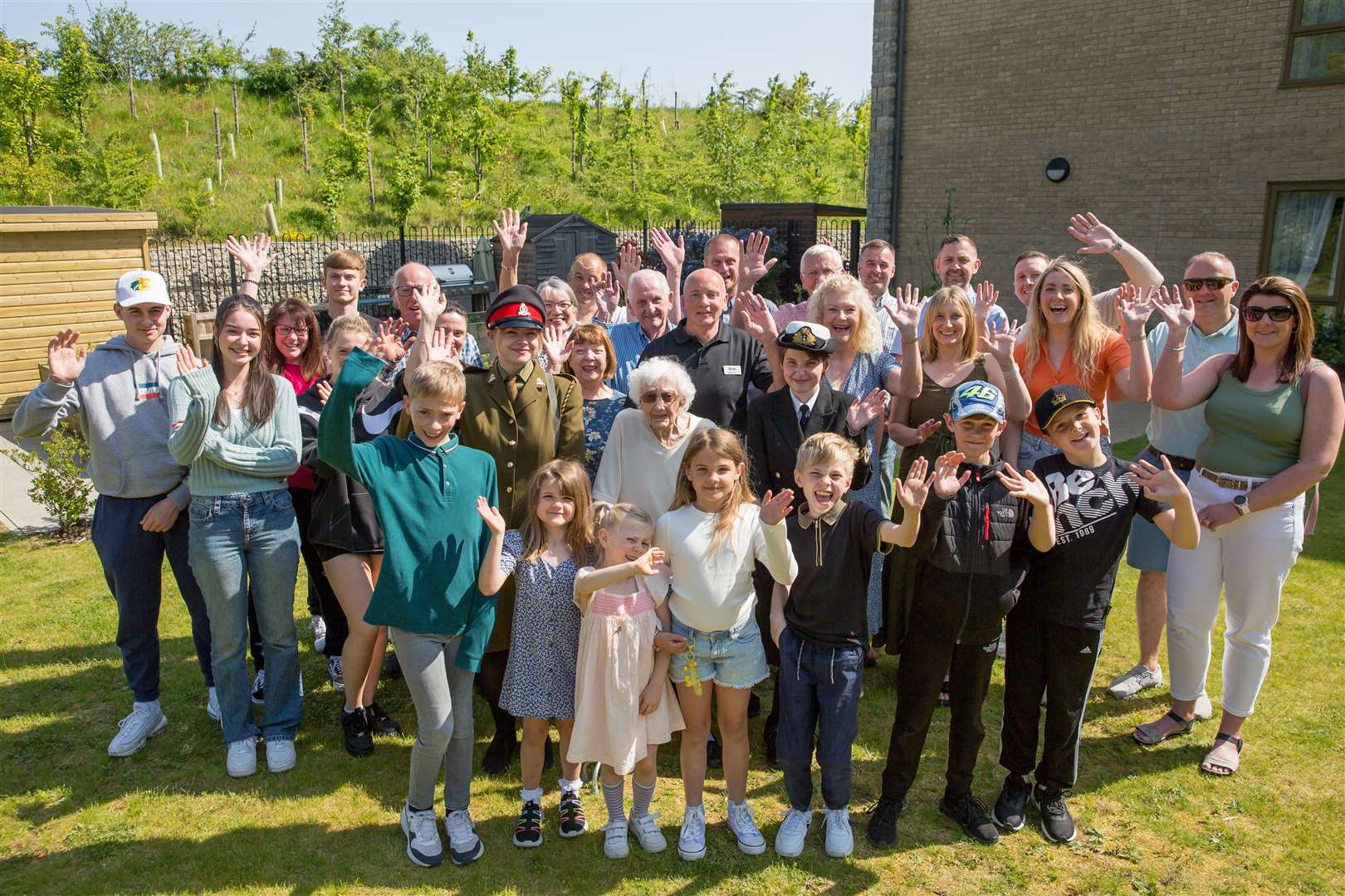 Mary Savage’s family and friends at Invicta Court. Standing behind her, in black, is Brian Thornton