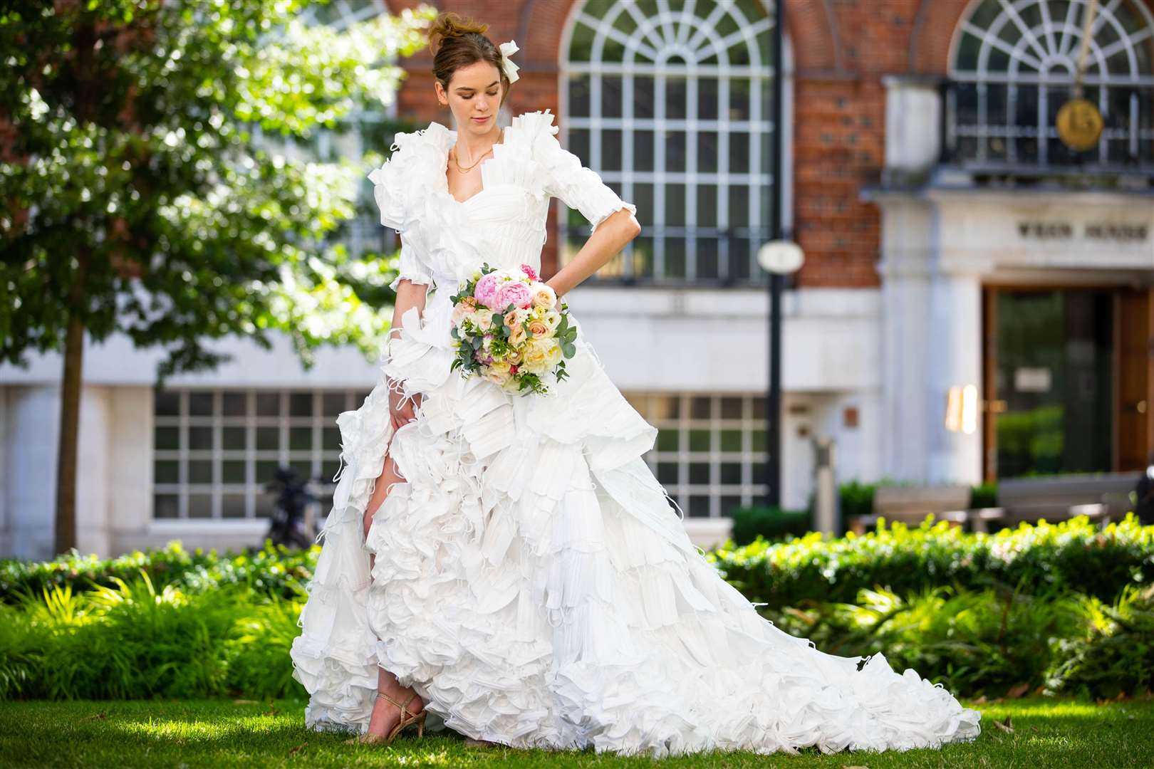 The dress was unveiled to celebrate the lifting of restrictions on weddings in England from Monday (David Parry/PA)