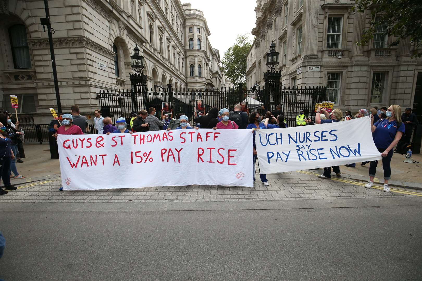 NHS workers outside Downing Street (Jonathan Brady/PA)