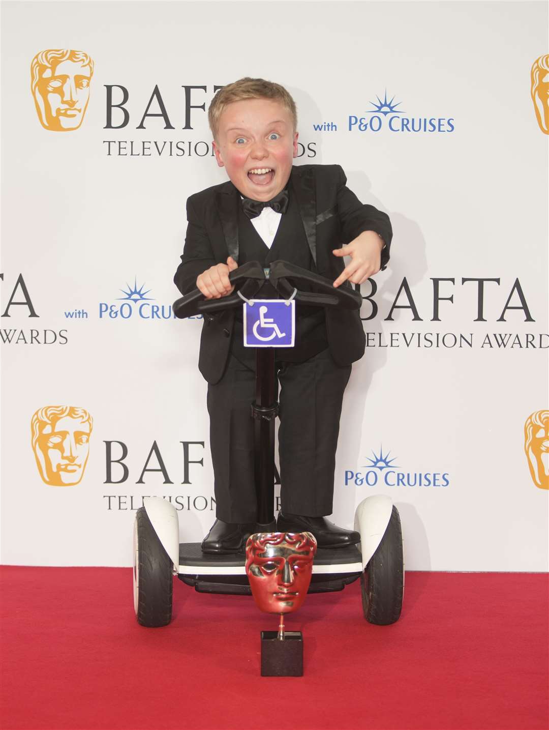 Lenny Rush with the award for Male Performance in a Comedy Programme (Jeff Moore/PA)