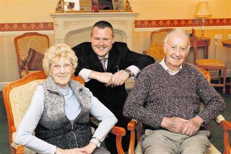 Paul Reynolds with residents June, 79, and Harry Lynch, 80, who were evacuated after the flood at Read Court, Westgate-on-Sea