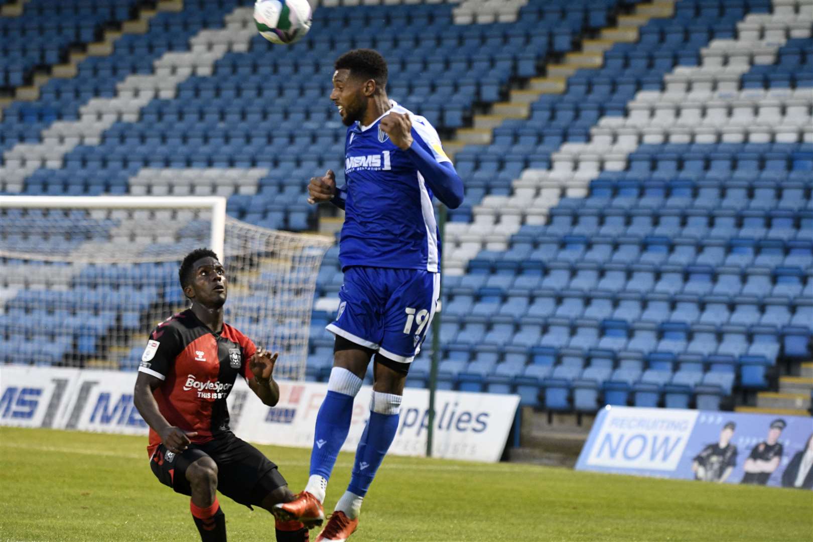 Vadaine Oliver gets up for the header Picture: Barry Goodwin