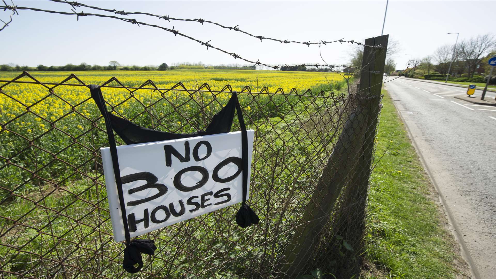 Views of land and signs at a site off Otterham Quay Lane, Rainham.