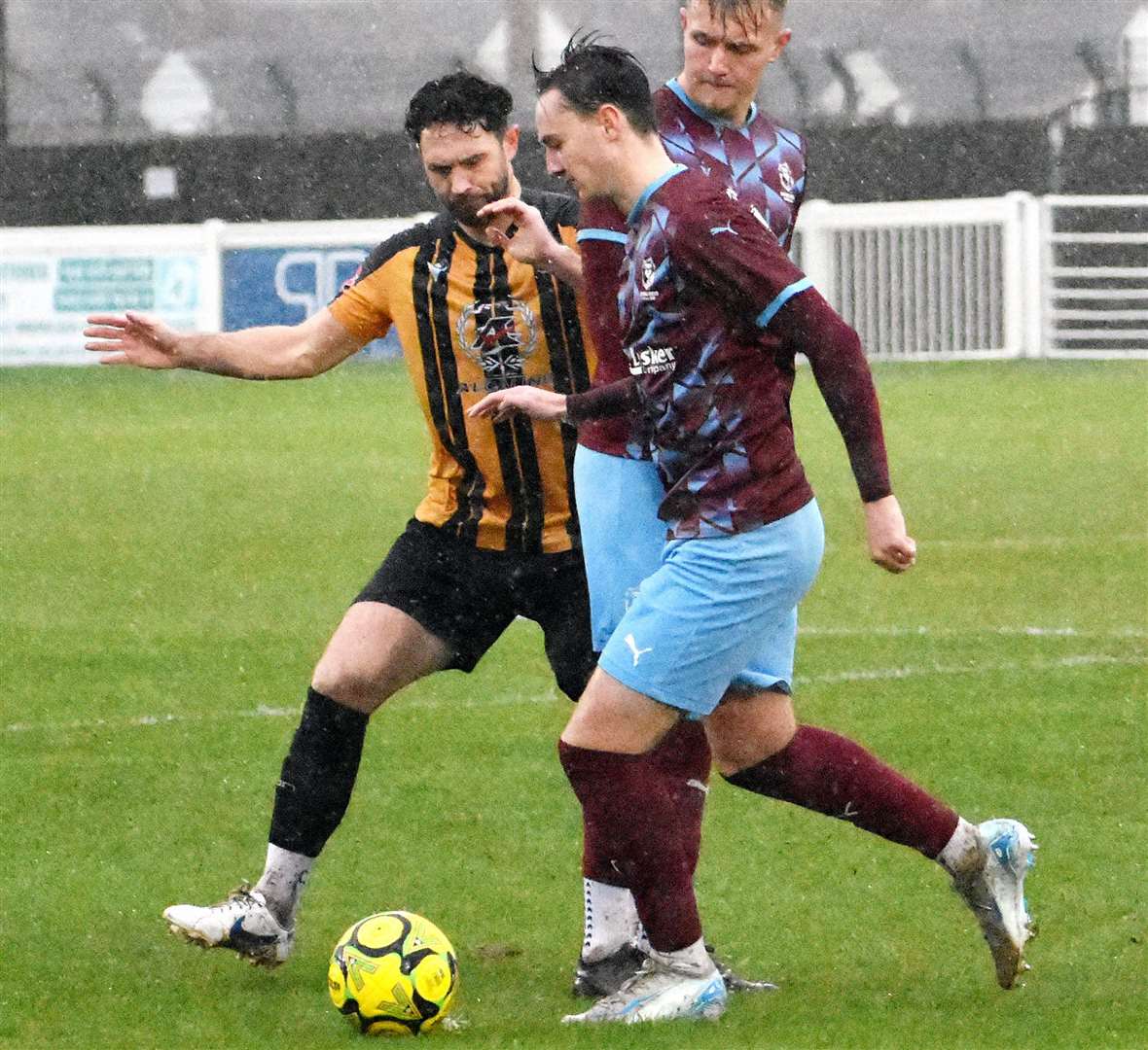 Folkestone midfielder Dean Rance keeps an away player in check. Picture: Randolph File