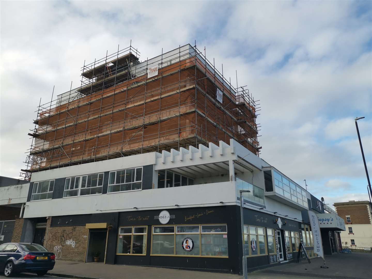 Faith in Strangers in Cliftonville with the flats above