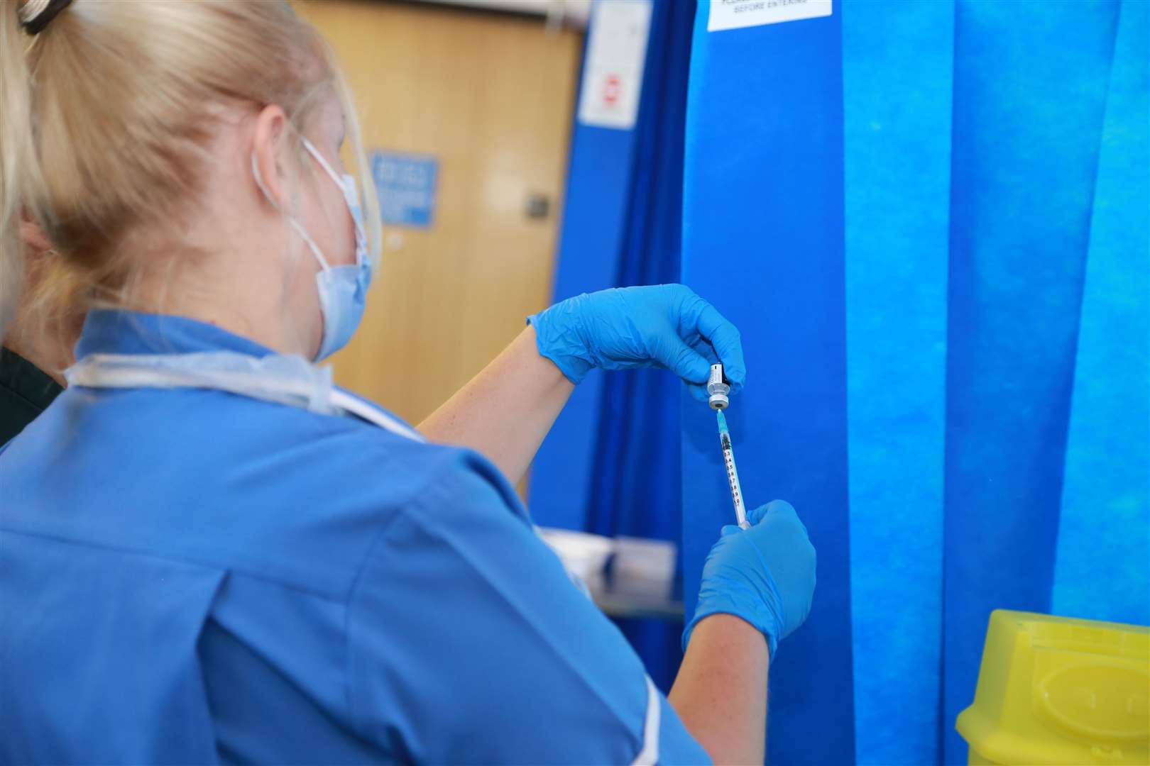 A nurse gives out the Covid-19 Pfizer vaccine at Medway Maritime Hospital in Gillingham. Picture: Medway NHS Foundation Trust (43916330)