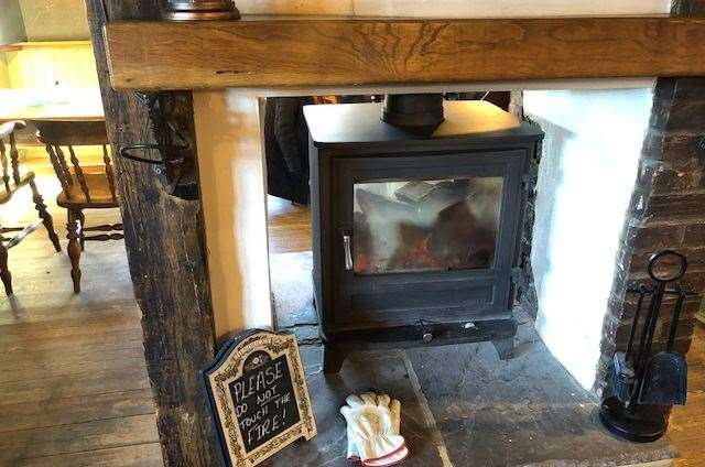 More recent additions to this historic hostelry, this is just one of two, double-sided wood burners used to heat both the bar and dining room