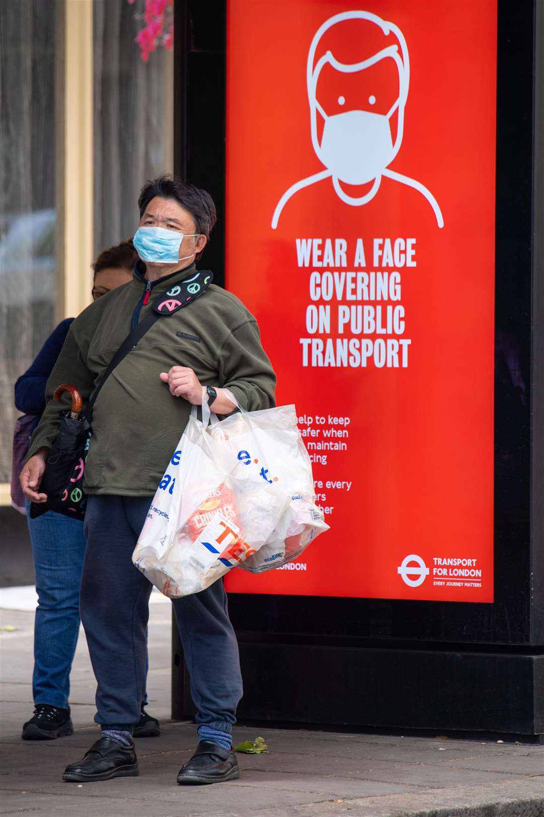 Wearing a face covering is mandatory for passengers on public transport in England (Dominic Lipinski/PA)