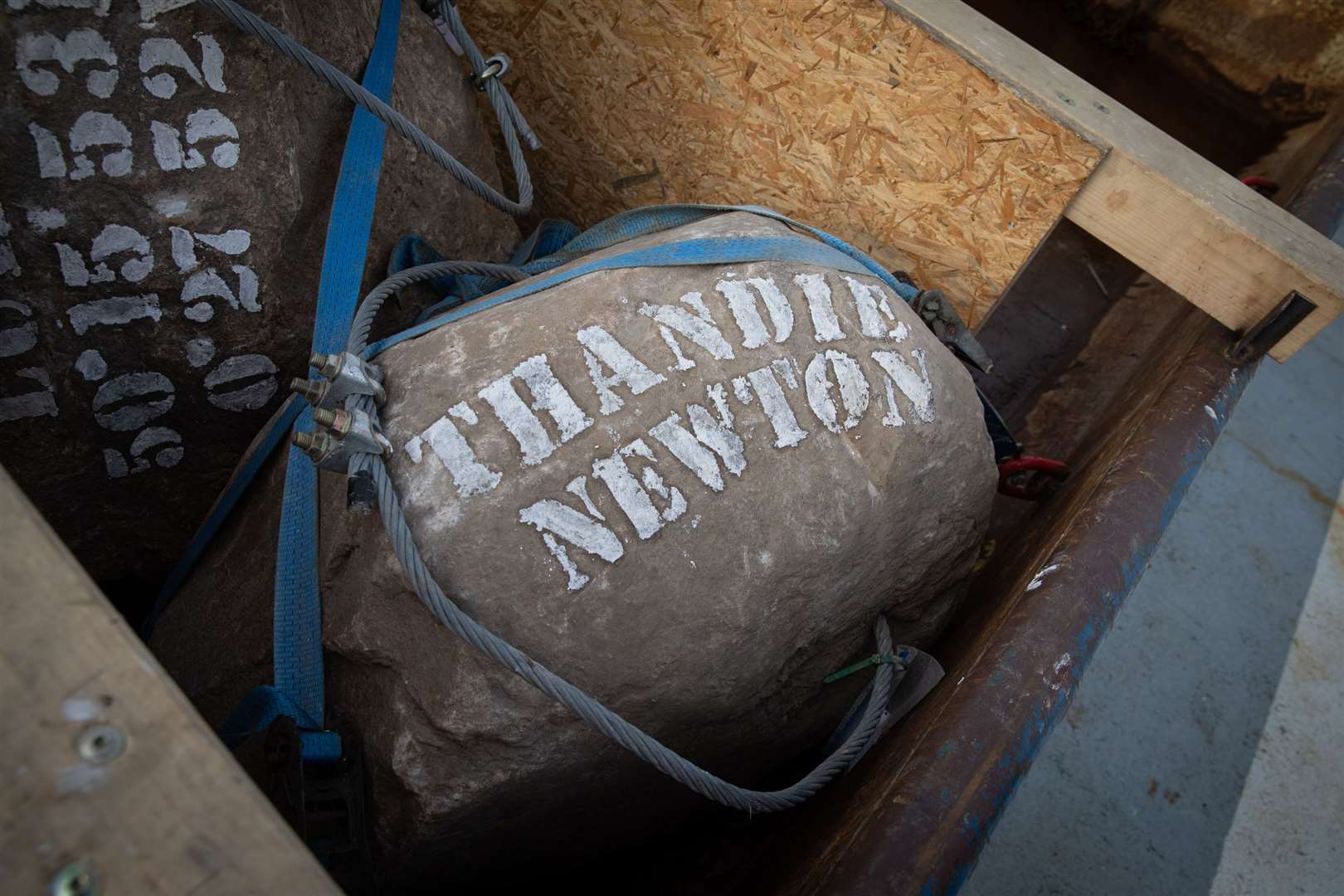 Celebrities including Thandie Newton have put their names to boulders forming the barrier in the sea (Suzanne Plunkett/Greenpeace/PA)