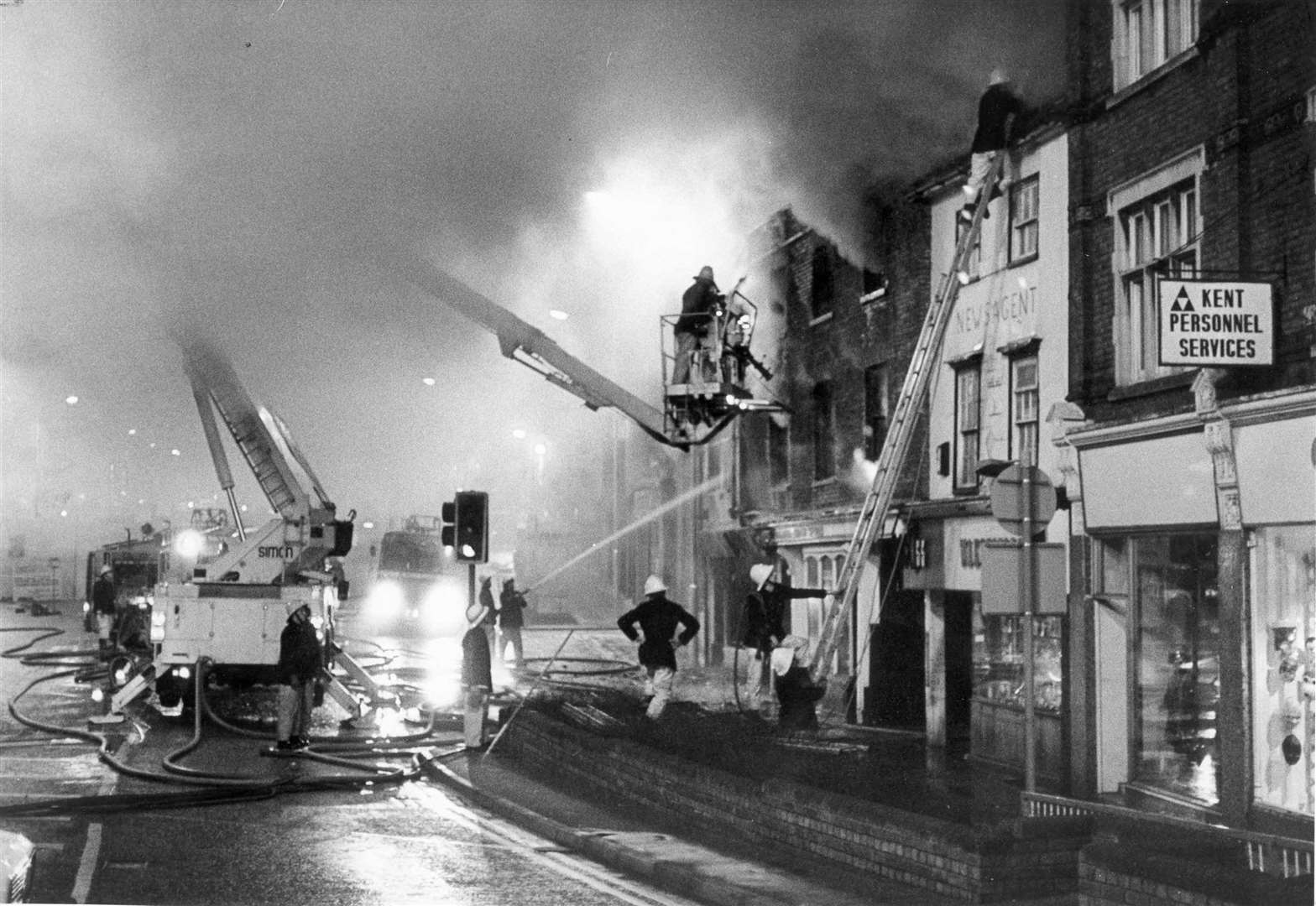The flames tore through Maidstone Motor Spares shop in High Street, Maidstone, in March 1984, with exploding paint cans creating a serious hazard for firemen. Part of the 17th century listed building collapsed and there was also damage to neighbouring properties