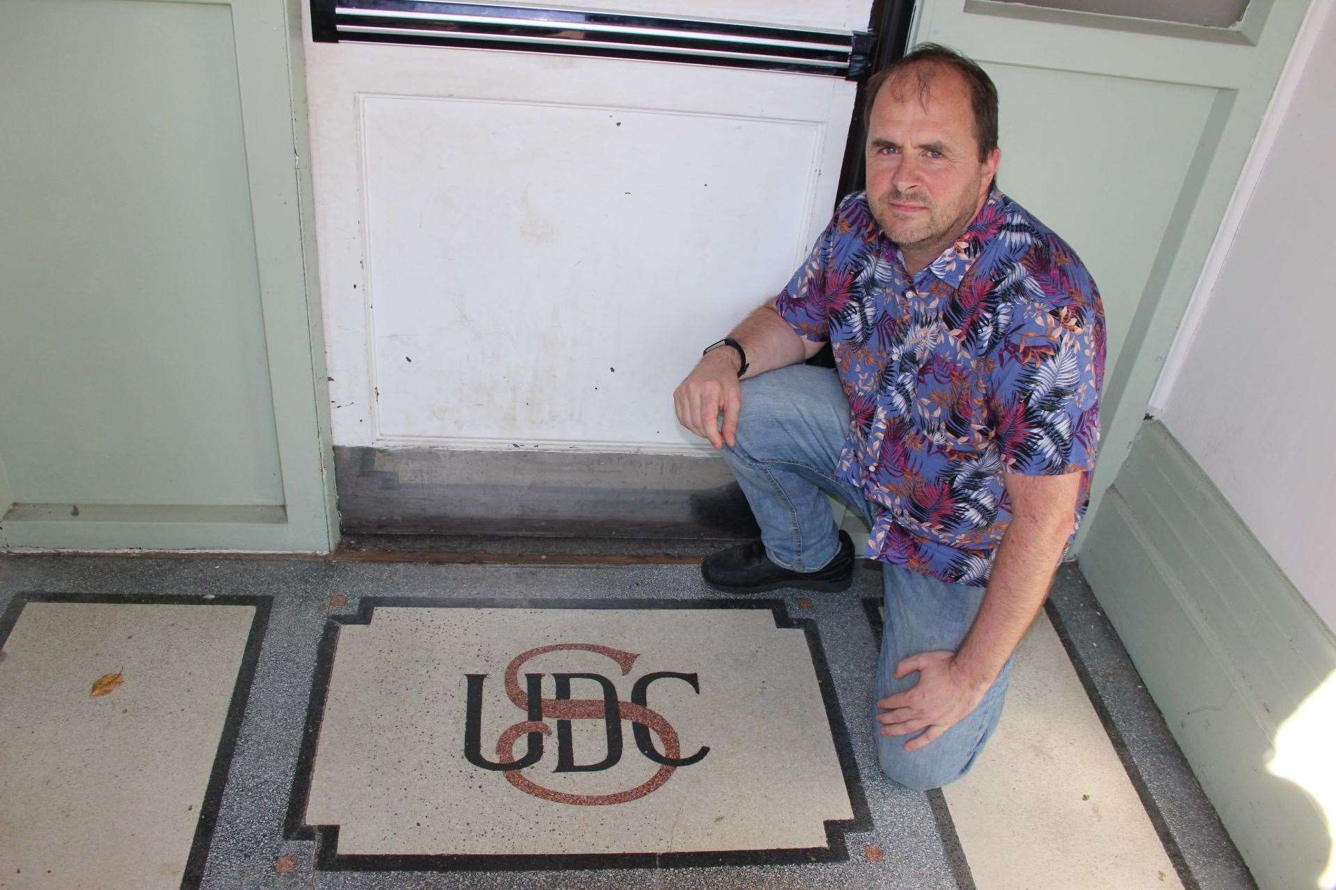 Chris Foulds of Sheerness Town Council with the old Sherness Urban District Council floor mosaic (15153532)