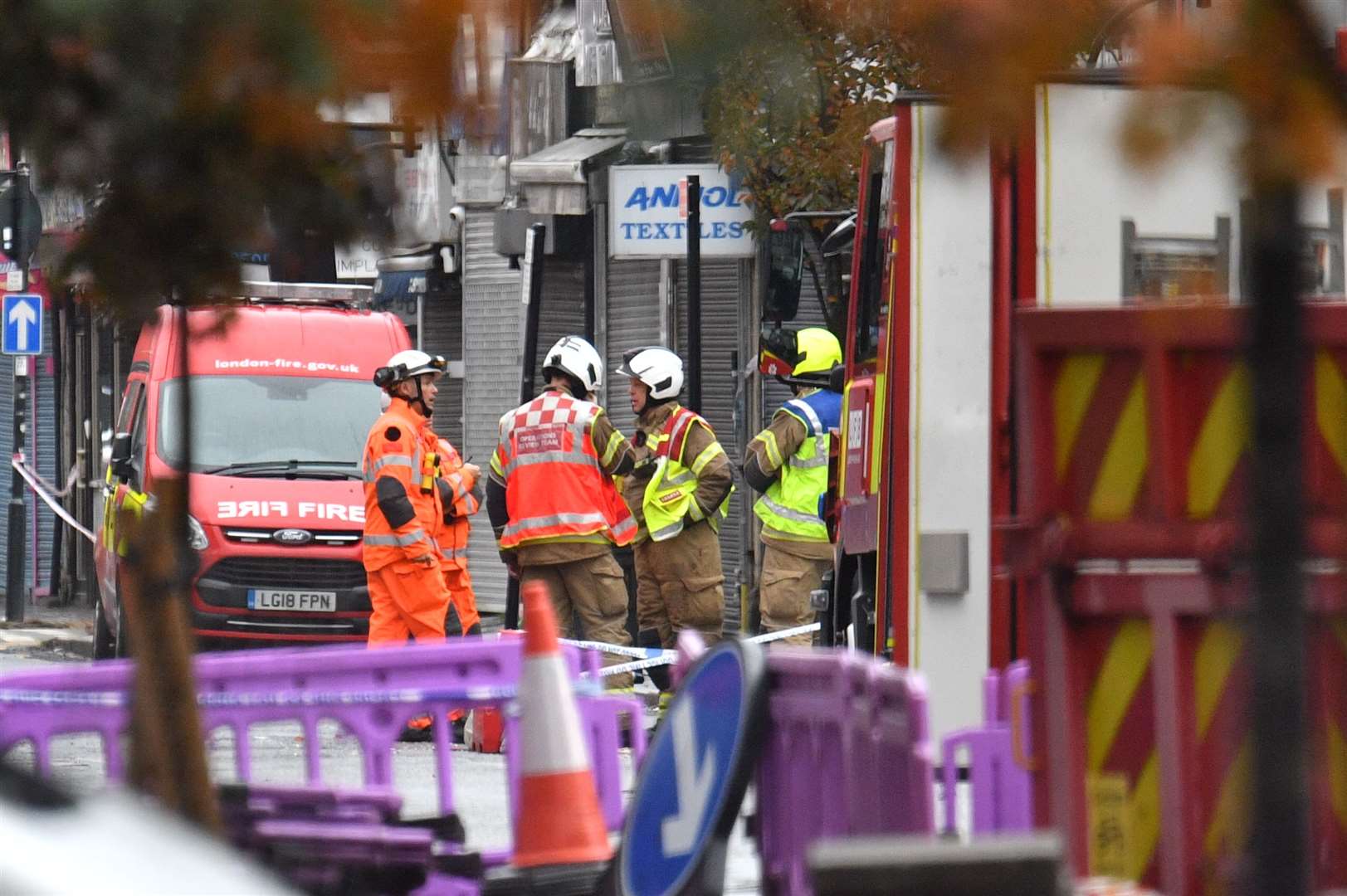 Emergency services at the scene (Dominic Lipsinki/PA)