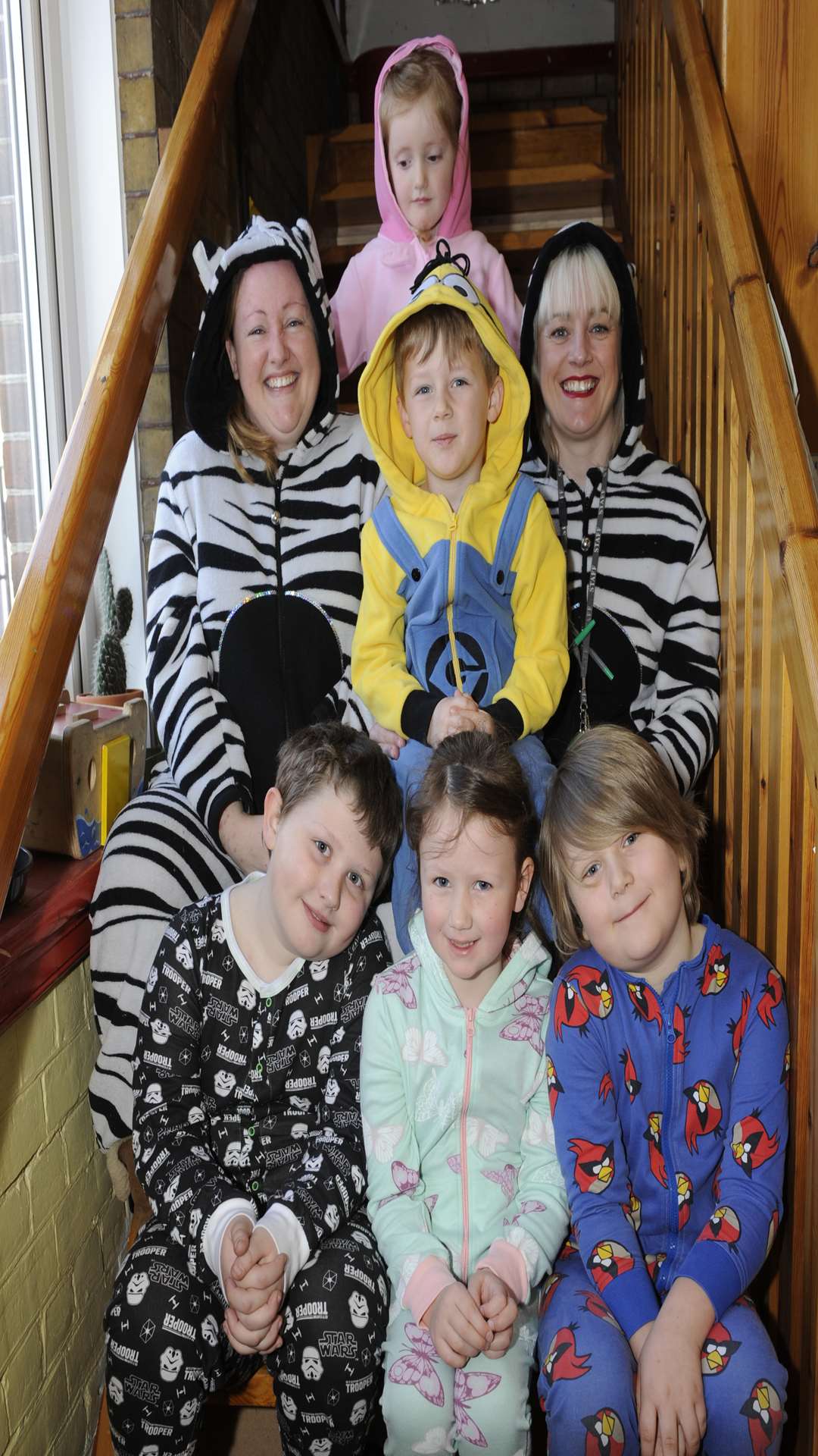 Teacher Anna Palmer and TA Diana Dodds with pupils from YR, Y1 and Y4