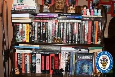 Books, including many about serial killers, found at the killers’ “flat of horrors” (West Midlands Police/PA)