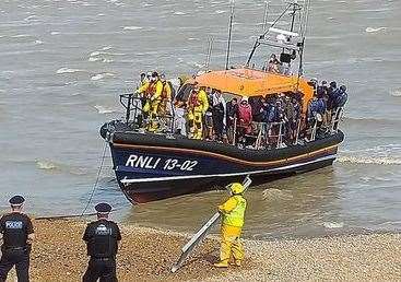 RNLI lifeboat brings ashore people rescued from the Channel at Dungeness