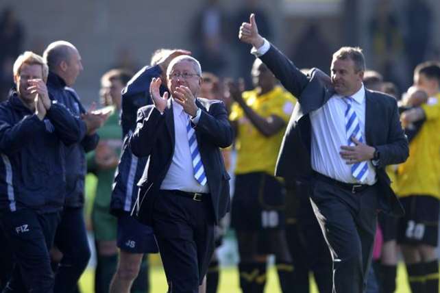 Chairman Paul Scally (centre) applauds the Gills fans after the final game of Gillingham title-winning League 2 season in April. Picture: Barry Goodwin