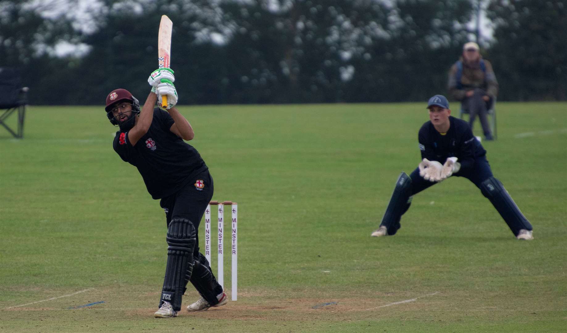 Haider Zaidi hits a four as Minster chase 184 against St Lawrence & Highland Court Picture: James Buttenshaw