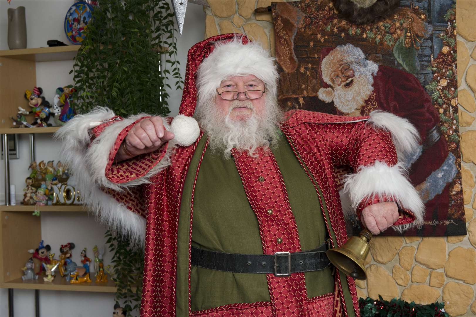 Ringing his bell: Brian Hopgood as Santa on the Isle of Sheppey. Picture: Simon Hildrew