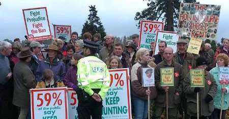 Police on hand as pro-hunt campaigners express their views outside the hotel. Picture: MATT WALKER