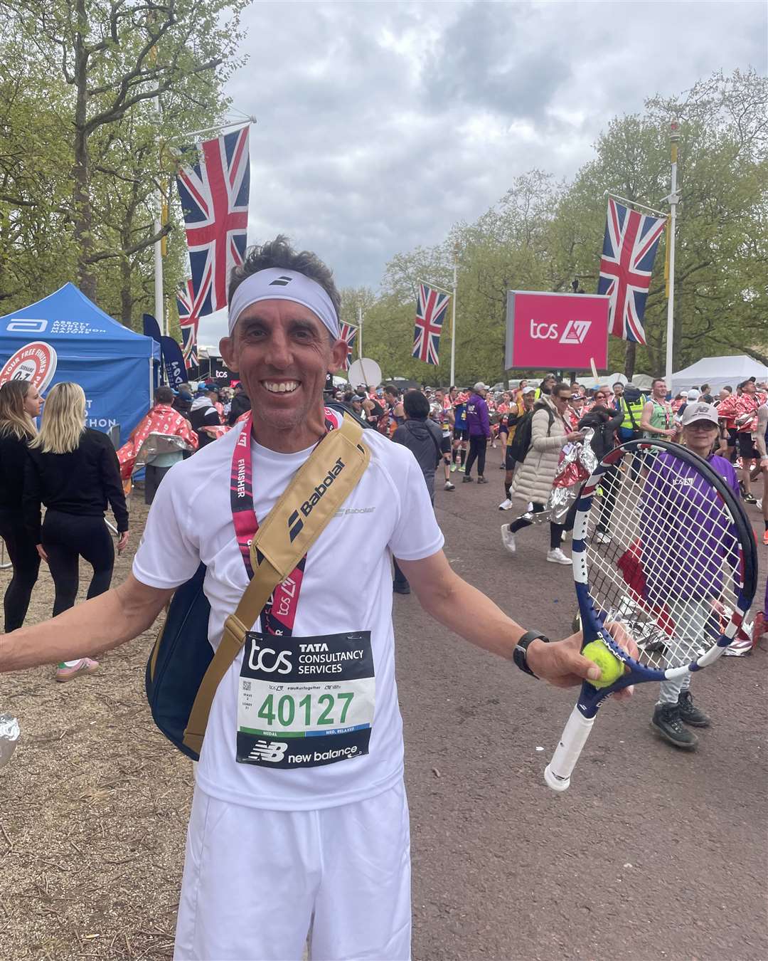 Sam Hull ran the London Marathon dressed as a tennis player (Samuel Montgomery/PA)