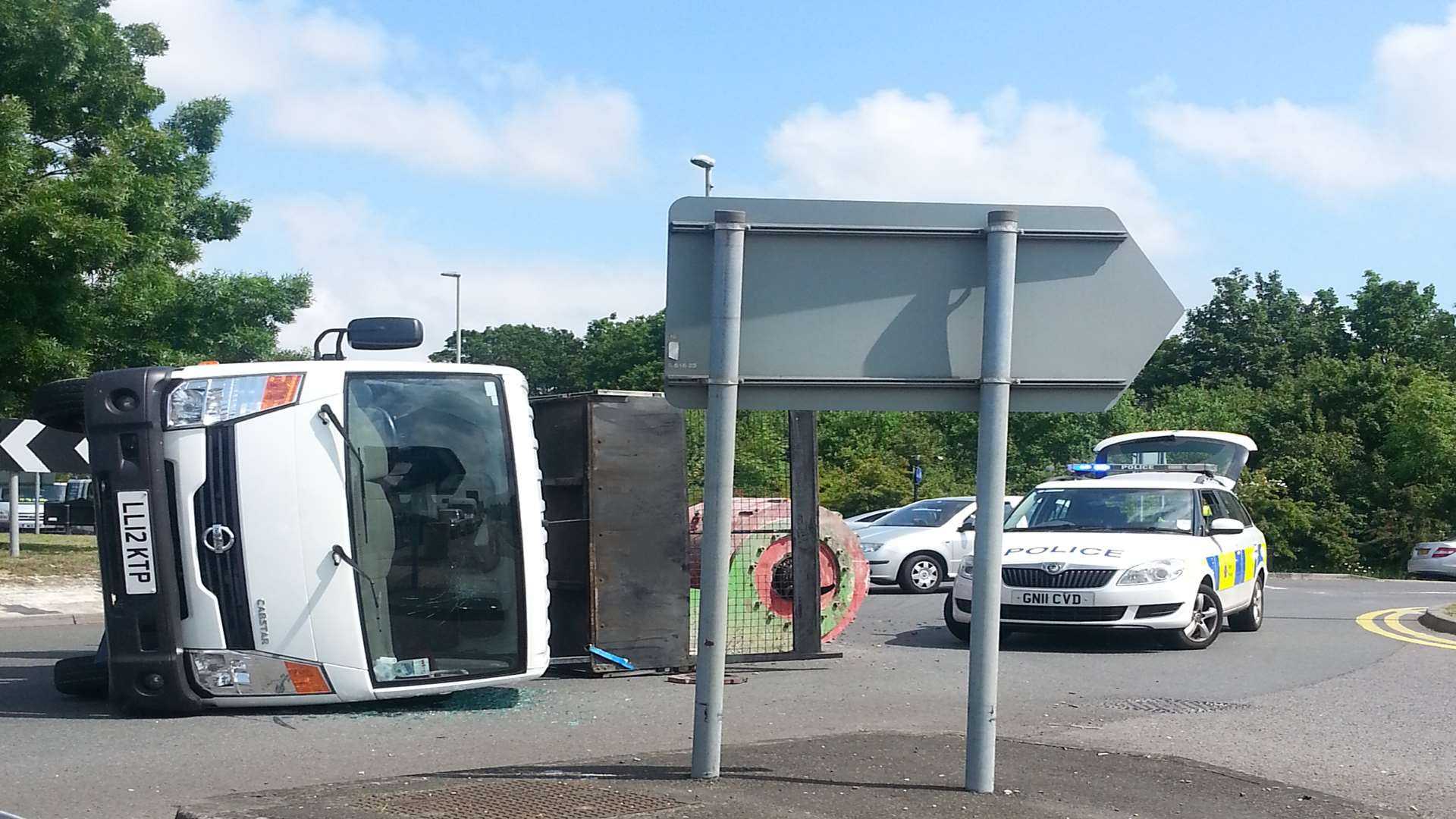 The vehicle tipped over on the Tank Roundabout. Picture: Ed Baker